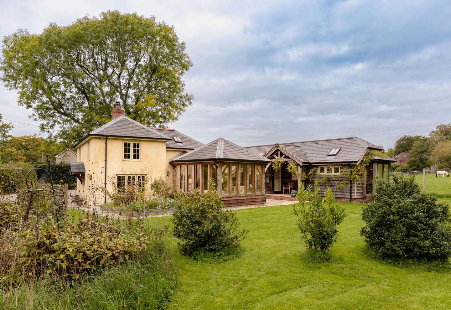 house renovation with a new oak framed garden room and oak framed barn in Hampshire
